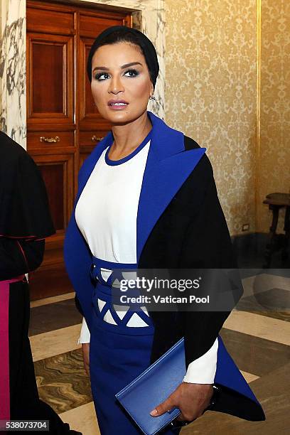 Sheikha Mozah bint Nasser Al Missned during a meeting with Pope Francis at his private library in the Apostolic Palace on June 4, 2016 in Vatican...