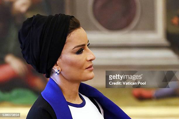 Sheikha Mozah bint Nasser Al Missned during a meeting with Pope Francis at his private library in the Apostolic Palace on June 4, 2016 in Vatican...