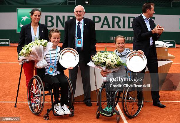 Runners up Aniek Van Koot and Jiske Griffioen of Netherlands pose with the trophies won during the Ladies Wheelchair Doubles final match against Yui...