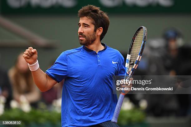 Marc Lopez of Spain in action during the Men's Doubles final match against Mike Bryan and Bob Bryan of the United States on day fourteen of the 2016...