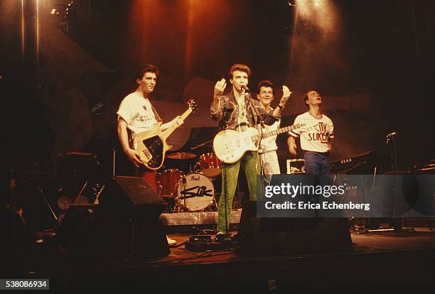 Slik perform on stage at New Victoria Theatre, London, 1976. L-R Jim McGinlay, Midge Ure, Kenny Hyslop, Billy McIsaac.