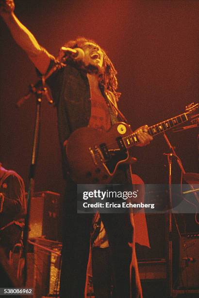 Bob Marley performs on stage at Hammersmith Odeon, London, 1976.