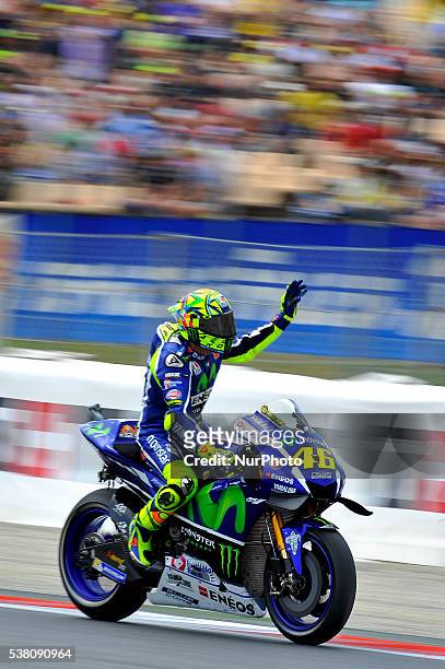 The Italian rider, Valentino Rossi, of Movistar Yamaha Team, riding his Yamaha, getting fans, during the MotoGP Qualifying, GP Monster Energy of...