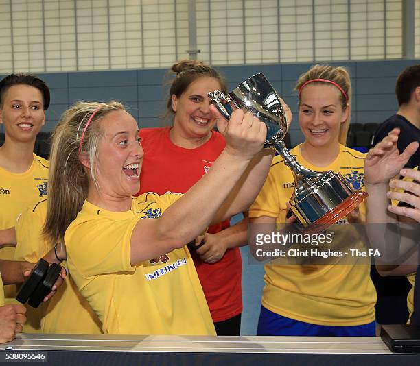 Louise Fensome captain of the University of Gloucestershire team celebrates with the trophy after winning the Women's FA Futsal Cup Finals at St....