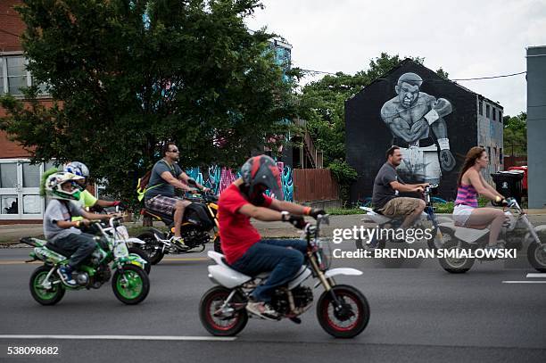 Mural with the image of boxing legend Muhammad Ali is seen on June 4, 2016 in Louisville, Kentucky. Ali, the three-time world heavyweight champion...