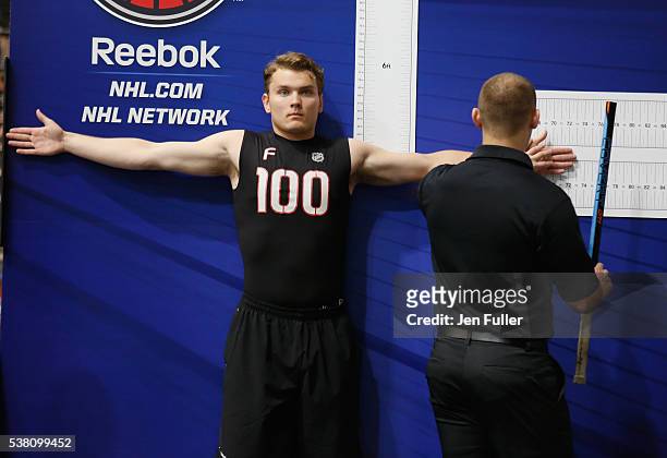 Kieffer Bellows is measured in Height/Wingspan during the NHL Combine at HarborCenter on June 4, 2016 in Buffalo, New York.