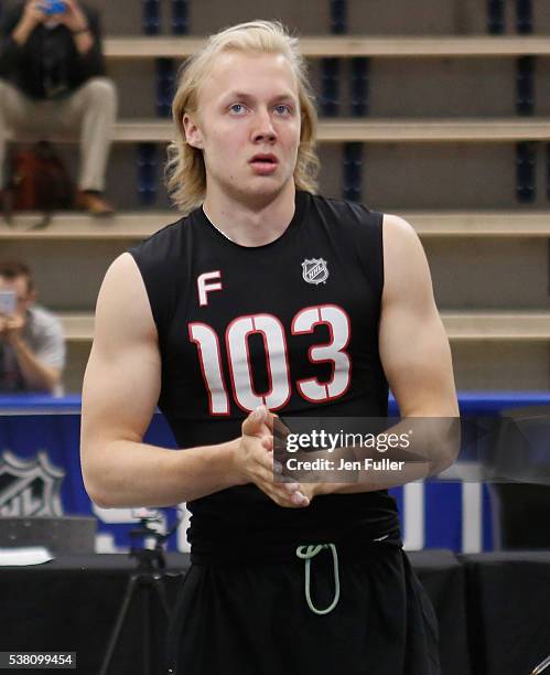 Alexander Nylander prepares to do Pull-ups during the NHL Combine at HarborCenter on June 4, 2016 in Buffalo, New York.