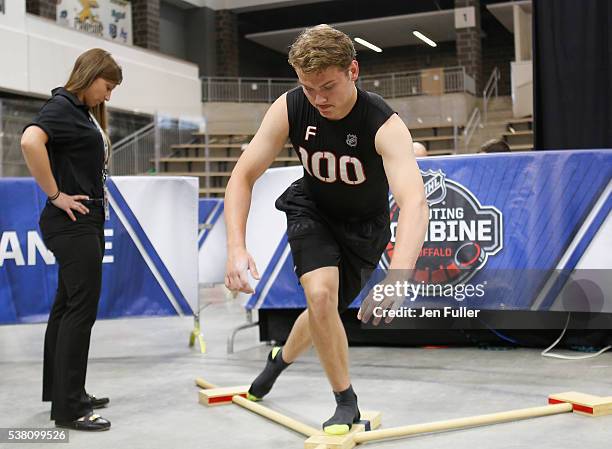 Kieffer Bellows does the Y-balance test during the NHL Combine at HarborCenter on June 4, 2016 in Buffalo, New York.