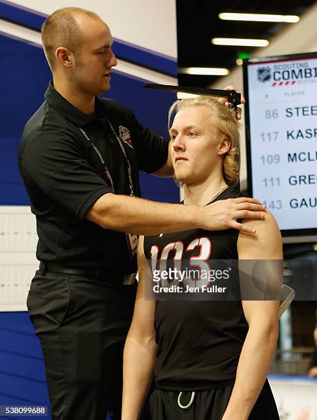 Alexander Nylander is measured for Height/Wingspan during the NHL Combine at HarborCenter on June 4, 2016 in Buffalo, New York.
