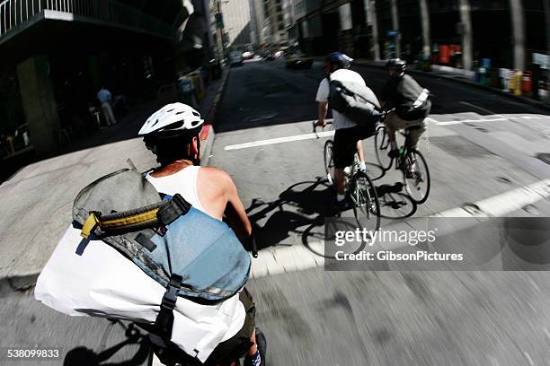bike messengers in san francisco - bicycle courier stock pictures, royalty-free photos & images