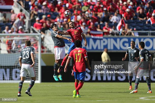 Marco Urena of Costa Rica and Gustavo Gomez of Paraguay fight for the ball during the 2016 Copa America Centenario Group A match between Costa Rica...