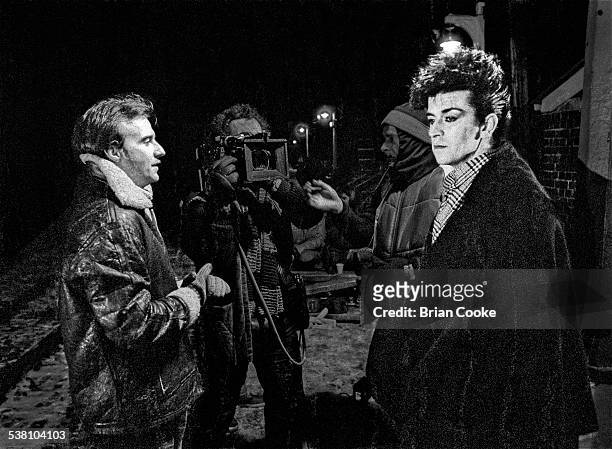 Guitarist Midge Ure and singer Steve Strange , of British new romantic group, Visage, during the filming of a video for the group's single, 'Night...