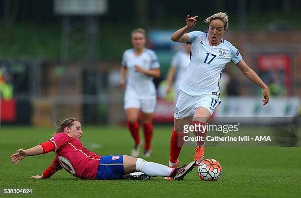 Gemma Davison of England is tackled by Jelena Cankovic of Serbia during the UEFA Women's European Championship Qualifier match between England and...