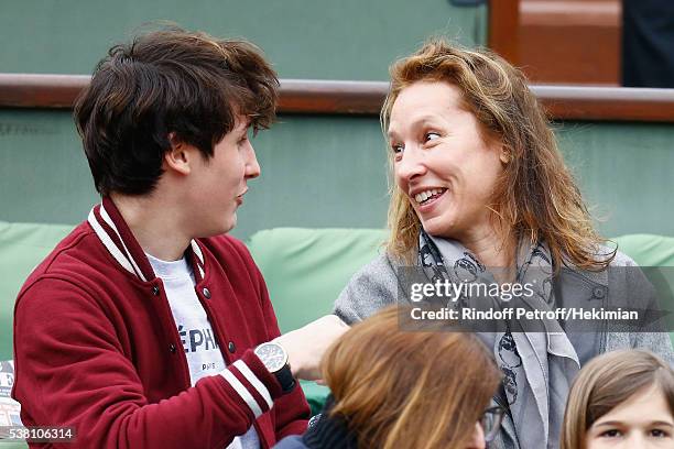 Emmanuelle Bercot and guest attend the French Tennis Open Day Fourteen at Roland Garros on June 4, 2016 in Paris, France.