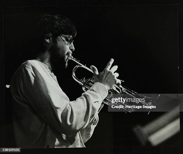 Guy Barker playing the trumpet at The Stables, Wavendon, Buckinghamshire. Artist: Denis Williams.