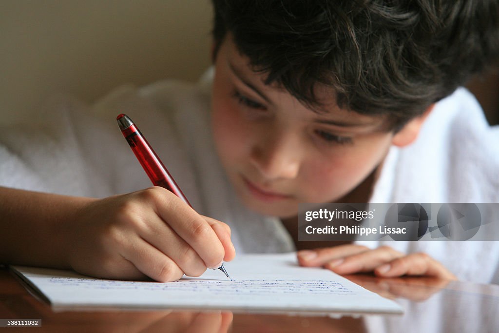 Boy Writing a Letter