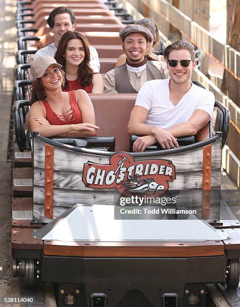 Sarah Hyland, Dominic Sherwood with Katie Stevens and character "Looking Glass Theo" riding a roller coaster at the GHOSTRIDER - Reopening! @ Knott's...