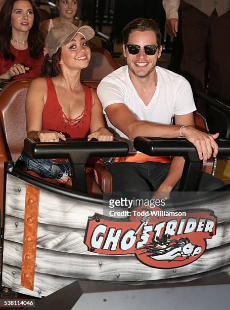 Sarah Hyland and Dominic Sherwood ride a rollarcoaster at the GHOSTRIDER - Reopening! @ Knott's Berry Farm, Buena Park CA at Knott's Berry Farm on...