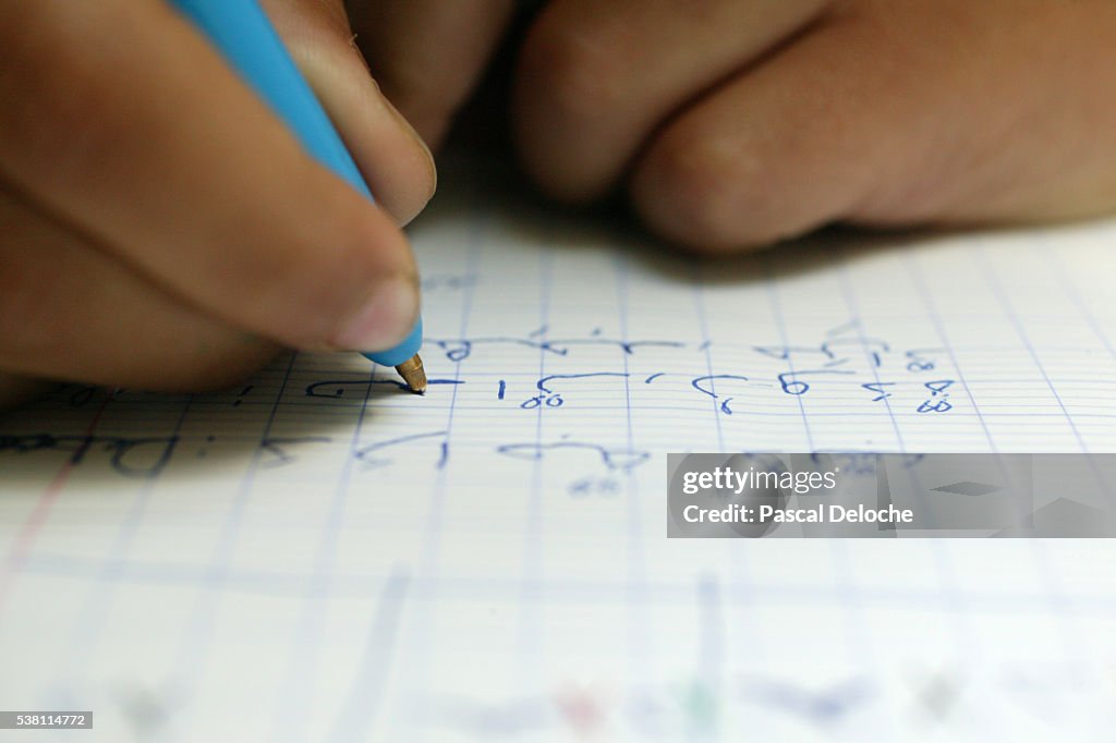 Child Learning to Write in Arabic