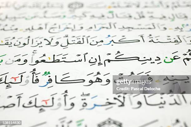 close-up view of koran script - arabic script stock pictures, royalty-free photos & images