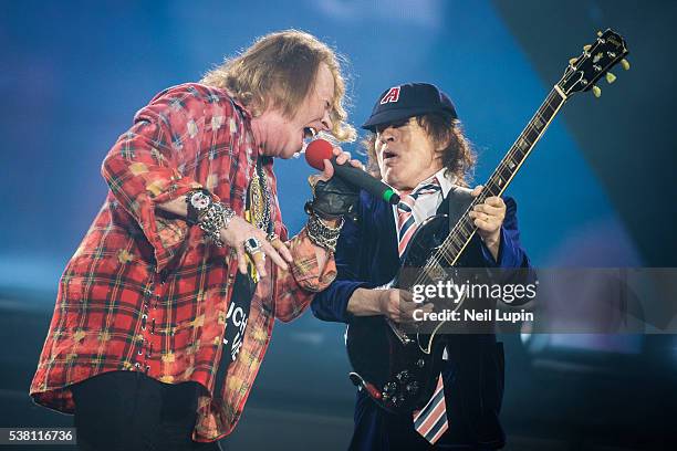 Angus Neil Model 82 Neil Lupin And Angus Young Photos & High Res Pictures - Getty Images