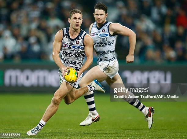 Joel Selwood of the Cats in action ahead of Patrick Dangerfield of the Cats during the 2016 AFL Round 11 match between the Geelong Cats and the GWS...