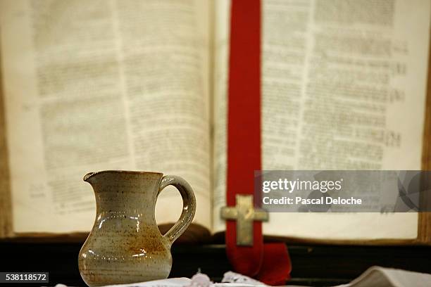 baptism water and protestant bible - baptism stock pictures, royalty-free photos & images