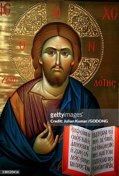 christ holding saint john's book icon at aghiou pavlou monastery on mount athos - igreja ortodoxa - fotografias e filmes do acervo
