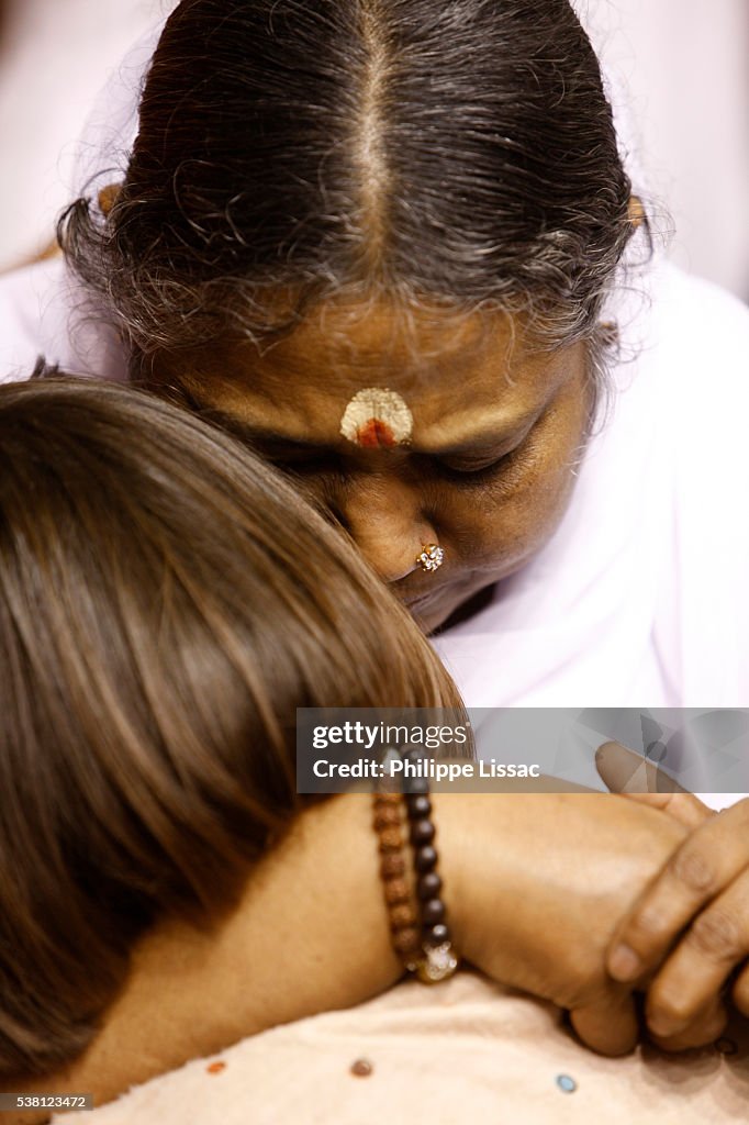 Mata Amritanandamayi Hugging a Devotee