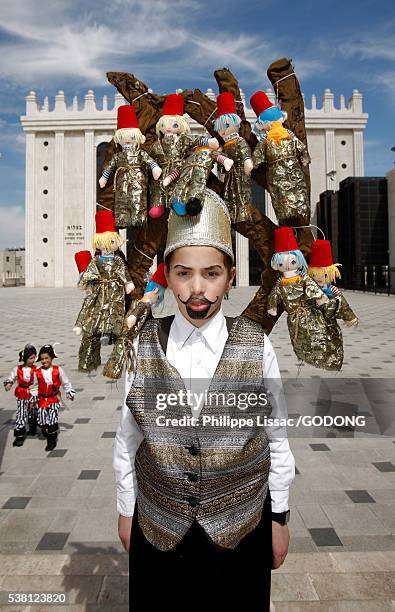 boy in costume - purim stock-fotos und bilder