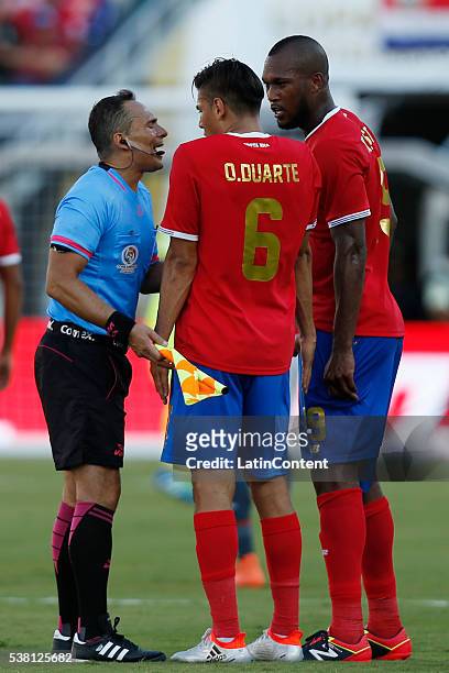 Oscar Duarte of Costa Rica talks with the referee during a group A match between Costa Rica and Paraguay at Camping World Stadium l as part of Copa...