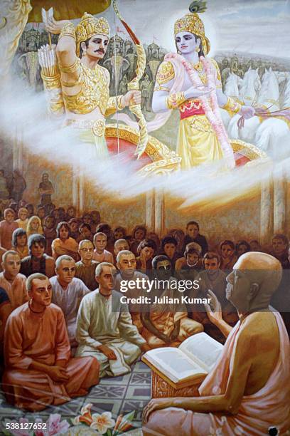krishna devotees listening to their master as depicted on a hare krishna calendar - krishna stock pictures, royalty-free photos & images