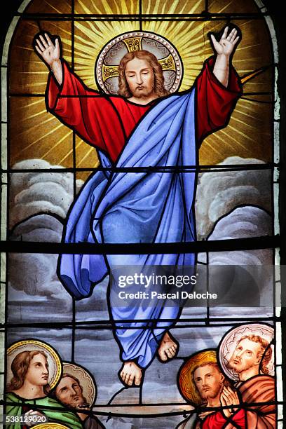 shrine of our lady of la salette stained glass window ascension of christ - feast of the ascension foto e immagini stock