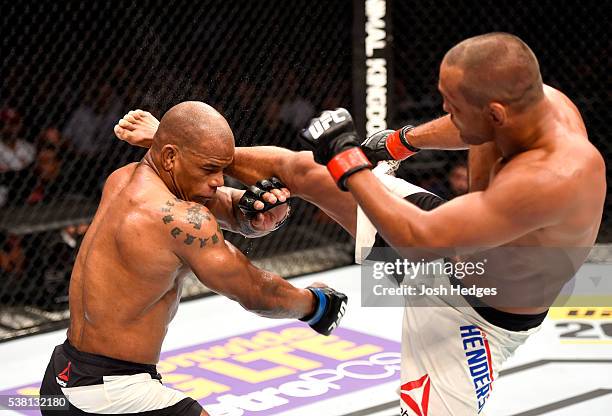 Dan Henderson kicks Hector Lombard of Cuba in their middleweight bout during the UFC 199 event at The Forum on June 4, 2016 in Inglewood, California.