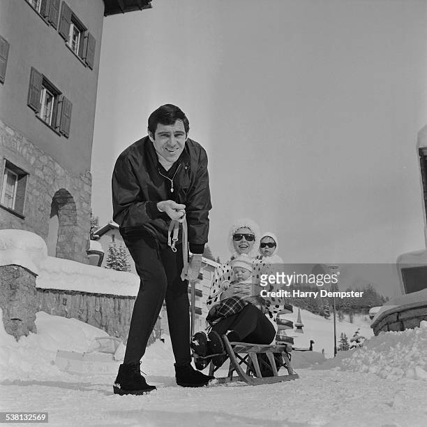 English actor, singer and songwriter Anthony Newley with his wife, English actress Joan Collins, and their children Tara Newley and Sacha Newley, St....