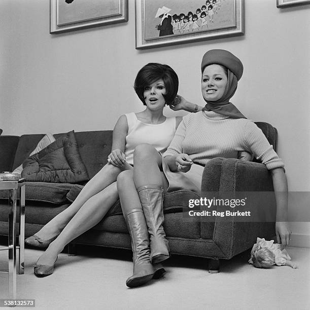 English actress Joan Collins and her sister, English novelist Jackie Collins, 8th January 1966.