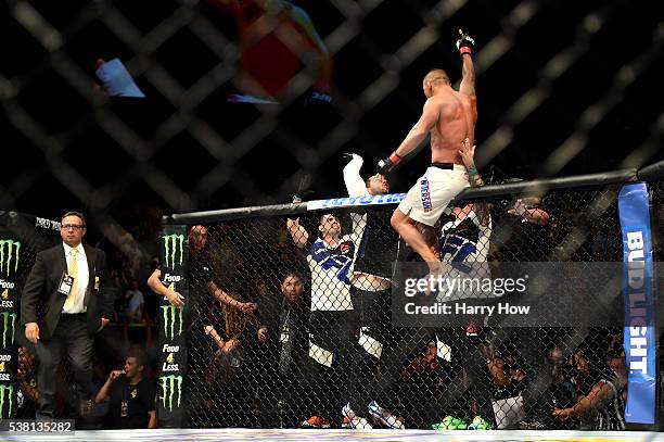 Dan Henderson celebrates after his knockout win in the second round against Hector Lombard in their middleweight bout during the UFC 199 event at The...