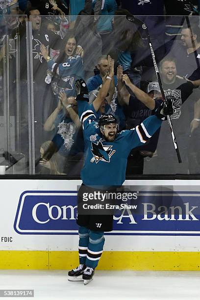 Joonas Donskoi of the San Jose Sharks celebrates his game winning goal against the Pittsburgh Penguins during overtime in Game Three of the 2016 NHL...