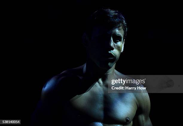 Urijah Faber walks to the Octagon for his fight against Dominick Cruz in their UFC bantamweight championship bout during the UFC 199 event at The...