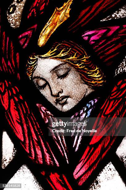 the american church in paris. stained glass window. angel. - stained glass angel stock pictures, royalty-free photos & images