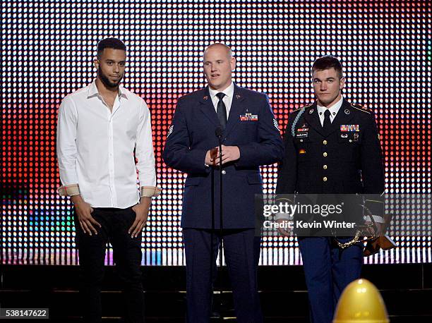 Honorees Anthony Sadler, Airman First Class Spencer Stone, and Specialist Alek Skarlatos accept the Hero Award onstage during Spike TV's 10th Annual...