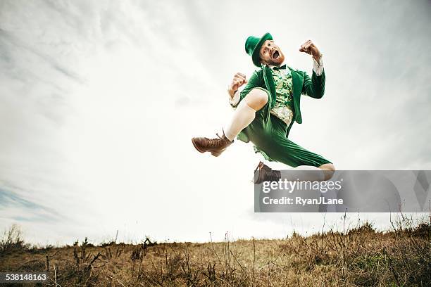 leprechaun man dancing on st. patricks day - funny irish stock pictures, royalty-free photos & images