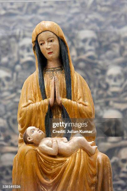 virgin and child with skulls in otranto duomo (relics of otranto's 800 martyrs) - otranto stock pictures, royalty-free photos & images