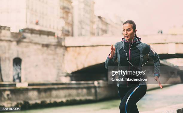 city running - paris sport stock pictures, royalty-free photos & images