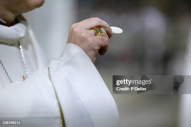 Communion By Hand 694 Communion Hand Stock Photos, High-Res Pictures, and Images - Getty ...