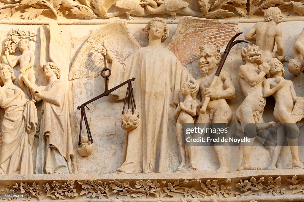 The damned are hurled to Hell. The last judgment. Western portal. Bourges cathedral.