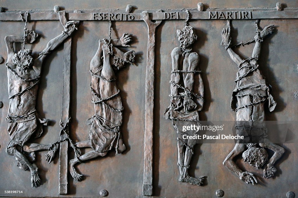 Army of Martyrs. Detail of a portal. Front Entrance Door of St. Peter's Basilica.