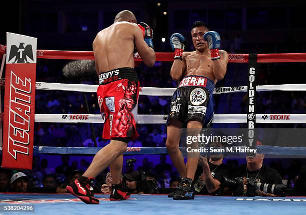 Orlando Salido forces Francisco Vargas into the ropes during their WBC super featherweight championship bout at StubHub Center on June 4, 2016 in...