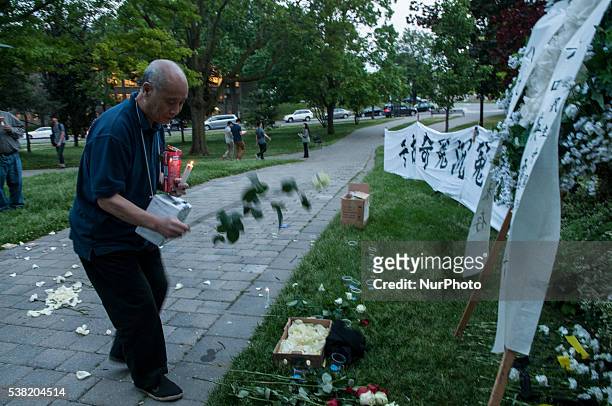 Chinese residents in Toronto stand outside the Chinese embassy on 04 June 2016 to commemorate the 27th anniversary of the Tiananmen pro-democracy...