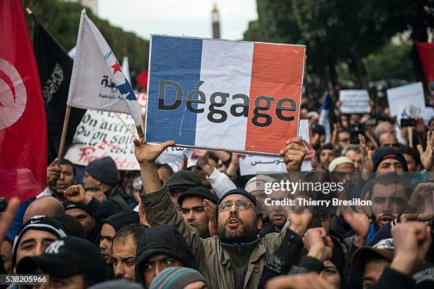 demonstration organized by ennahdha islamist ruling party against french meddling in tunisian politics after french minister manuel valls called ennahdha "a fascist party". - tunisia tunis stock pictures, royalty-free photos & images